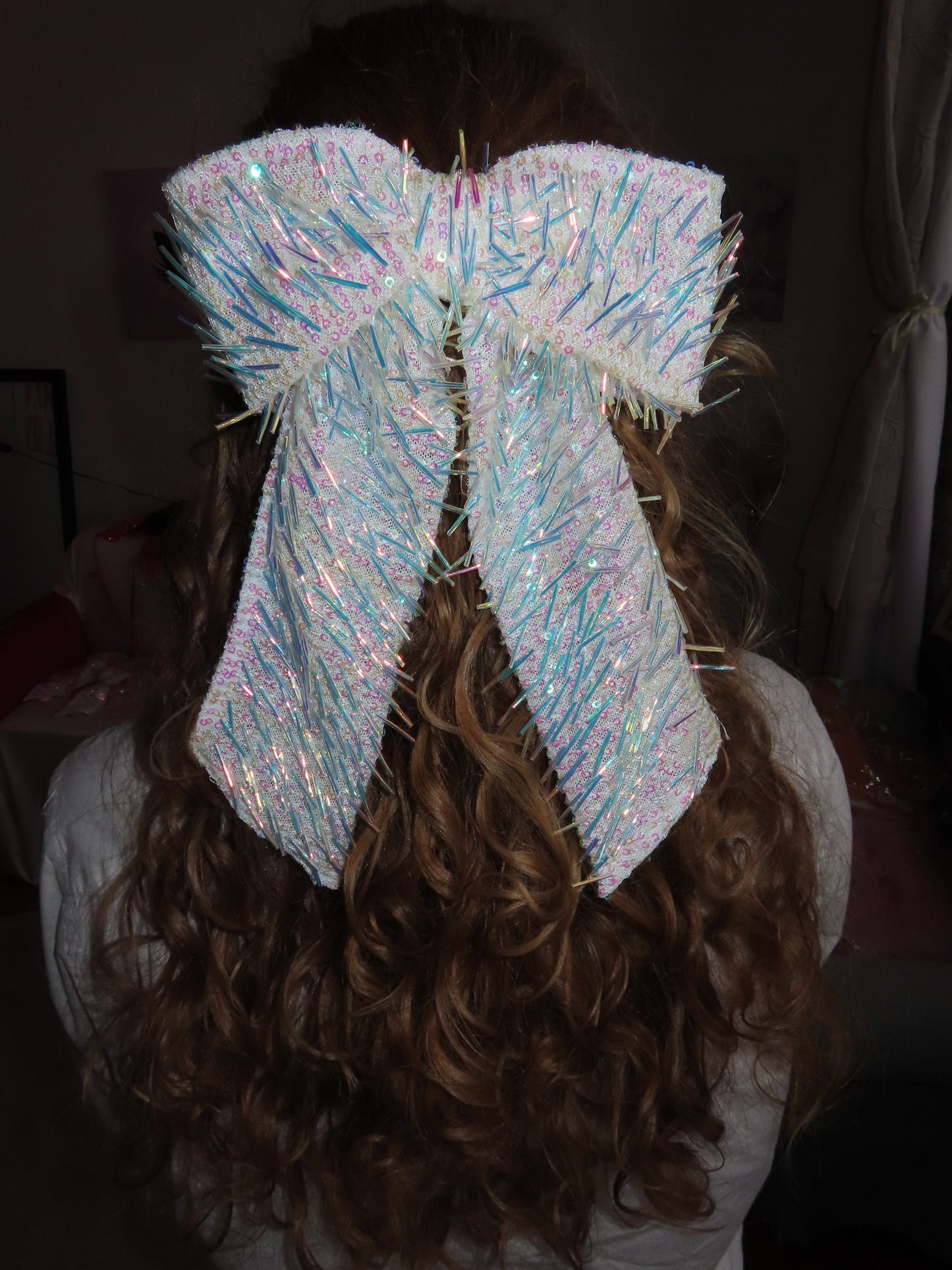 Fringey iridescent bow