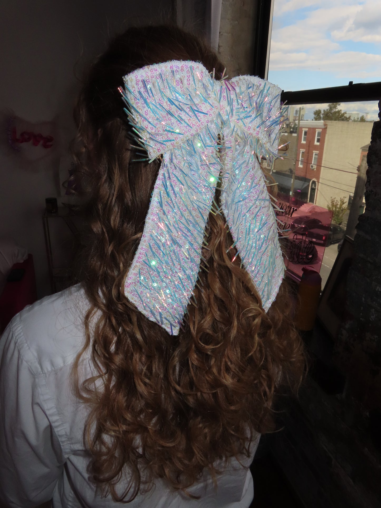 Fringey iridescent bow