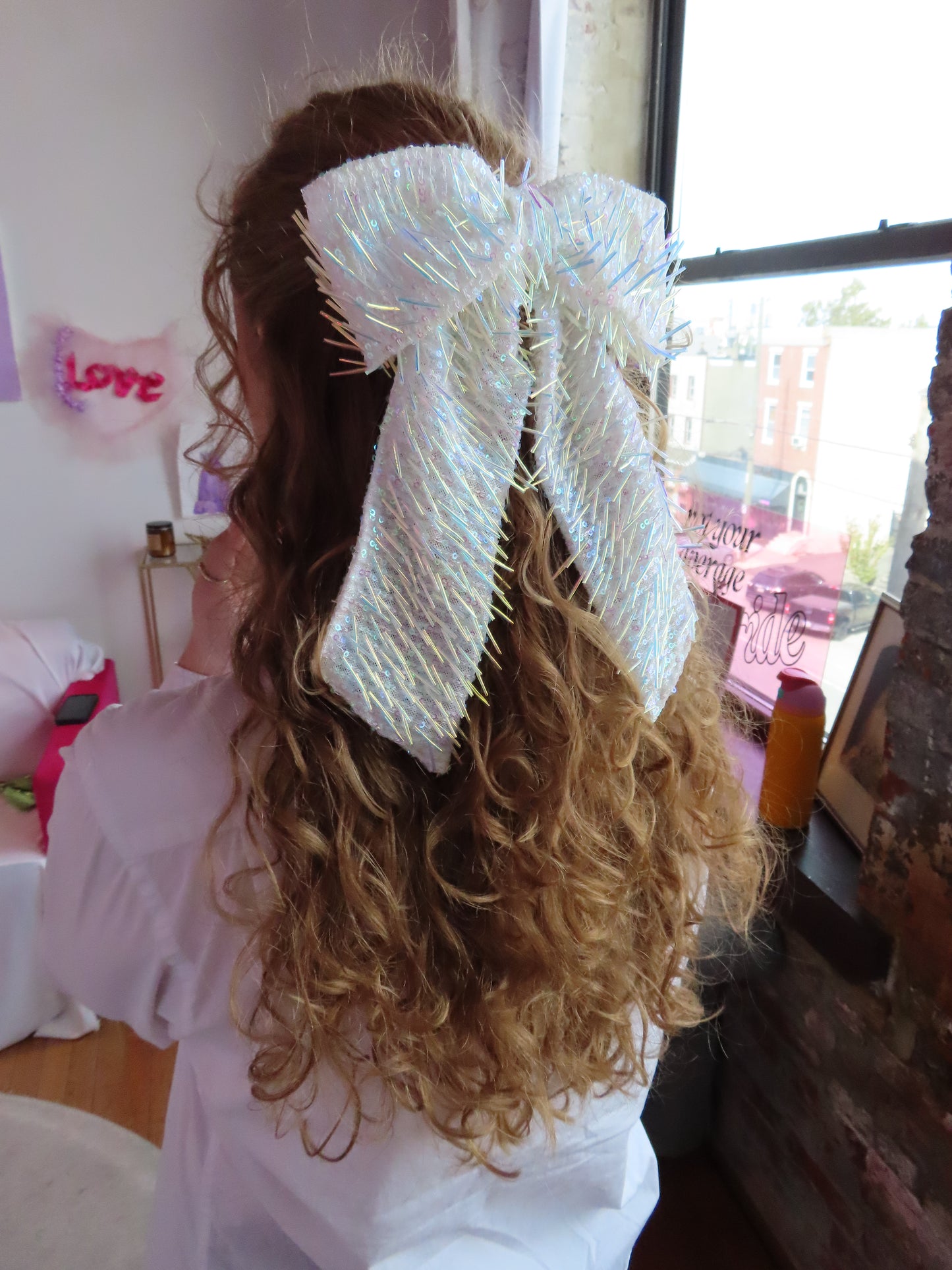 Fringey iridescent bow