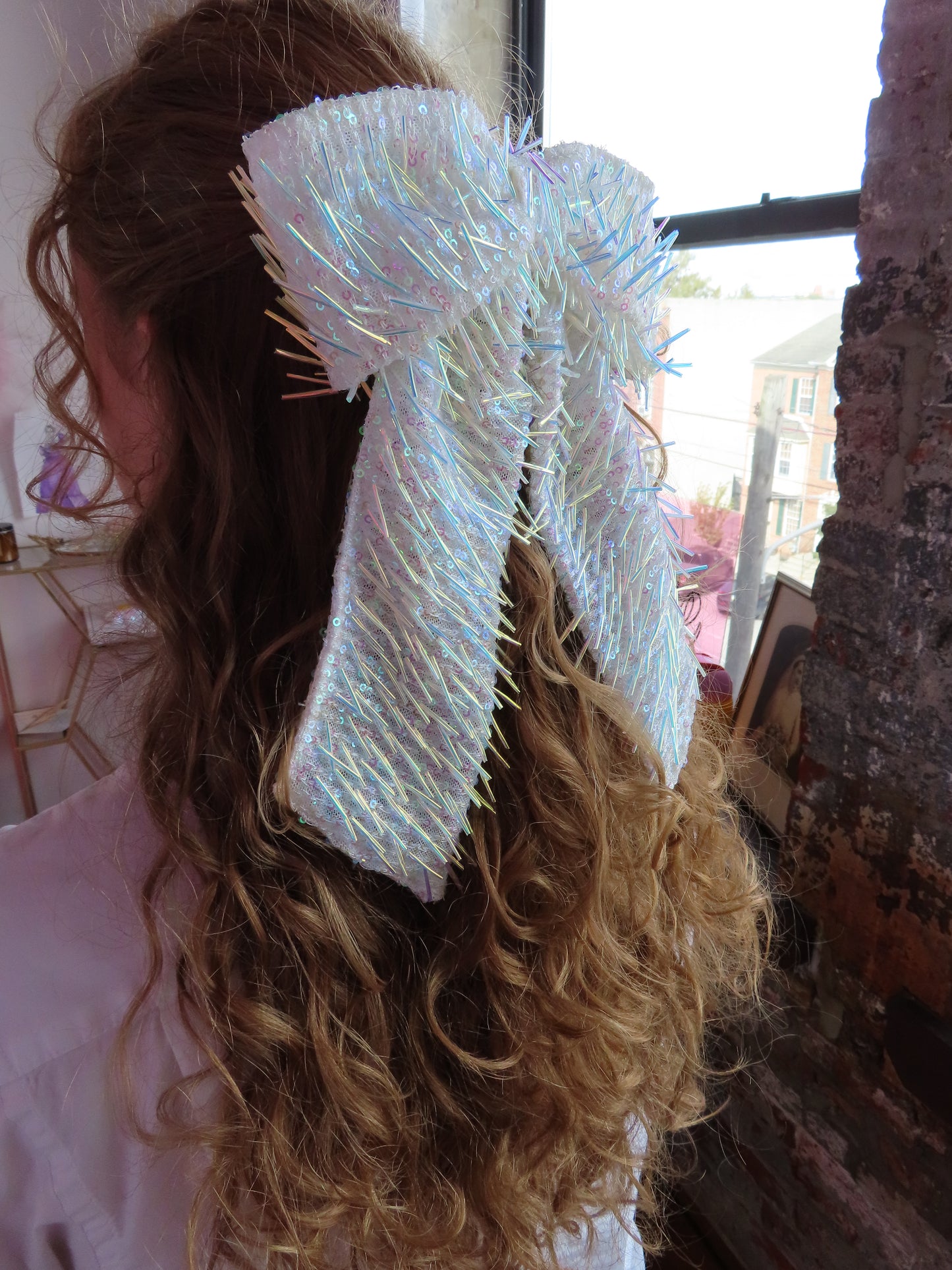 Fringey iridescent bow
